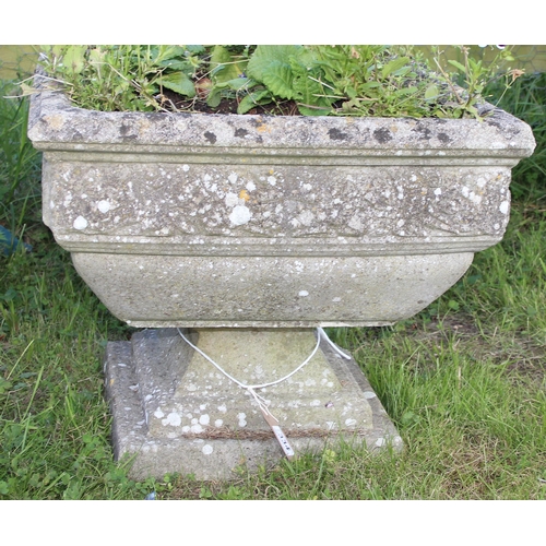 334 - A vintage weathered concrete garden pot with plants, approx 53cm square x 45cm tall, in 2 parts