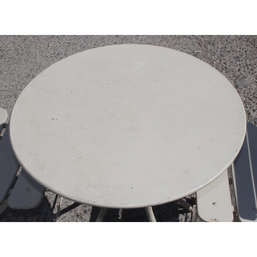 337 - A vintage grey painted metal bistro table and 2 chairs, the table approx 60cm in diameter