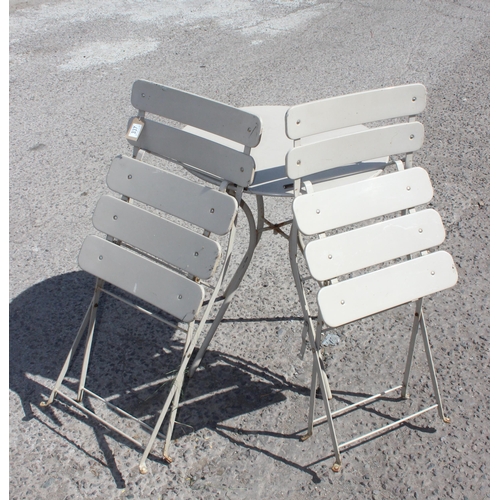 337 - A vintage grey painted metal bistro table and 2 chairs, the table approx 60cm in diameter