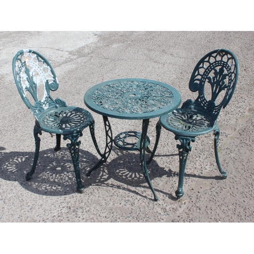 341 - A Victorian style aluminium garden table and 2 chairs, the table approx 60cm in diameter