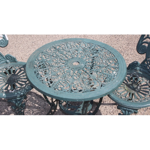 341 - A Victorian style aluminium garden table and 2 chairs, the table approx 60cm in diameter