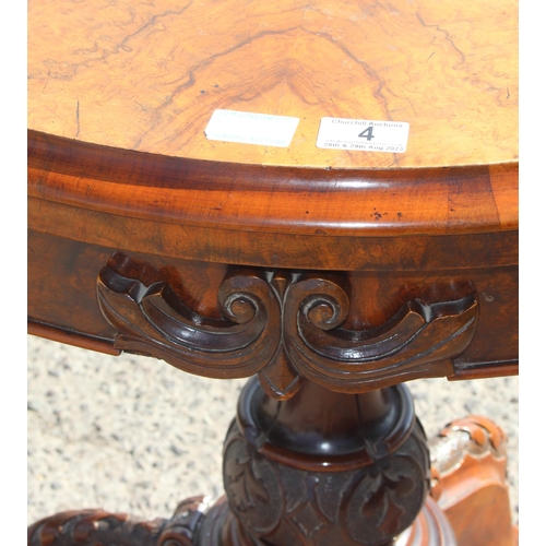 4 - A Victorian walnut fold over card table with baize line interior, with carved base and frieze, appro... 