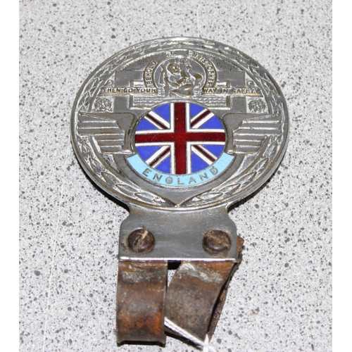 704 - A vintage chrome and enamel St Christopher car badge with Union Jack flag car badge