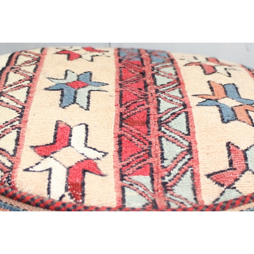 210 - A large vintage kilim pouffe or round cushion, approx 50cm in diameter