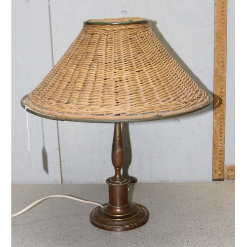 267 - An unusual vintage brass lamp with a woven wickerwork shade, approx 42cm tall