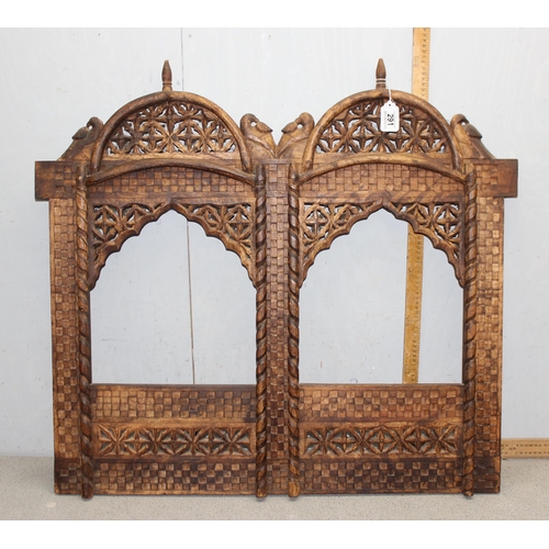 291 - An Indian carved hard wood screen, approx 90cm x 82cm