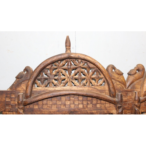 291 - An Indian carved hard wood screen, approx 90cm x 82cm