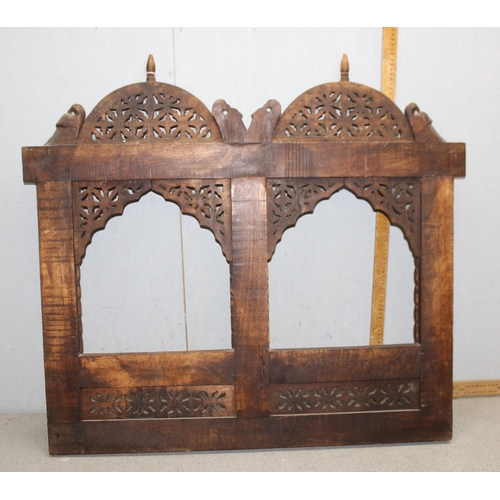 291 - An Indian carved hard wood screen, approx 90cm x 82cm