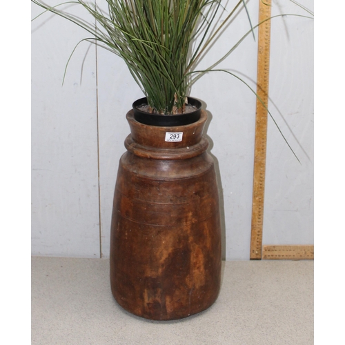 293 - A large African turned wooden vase, currently housing a faux plant, vase approx 48cm tall