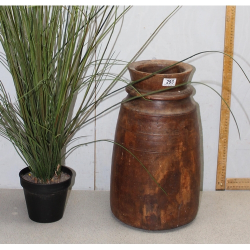 293 - A large African turned wooden vase, currently housing a faux plant, vase approx 48cm tall