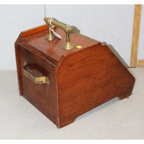 294 - A Victorian brass mounted mahogany coal box