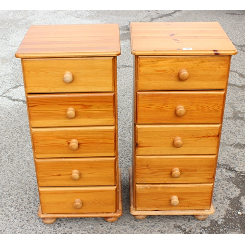 159 - A pair of modern pine 5 drawer bedside cabinets, each approx 46cm wide x 42cm deep x 98cm tall