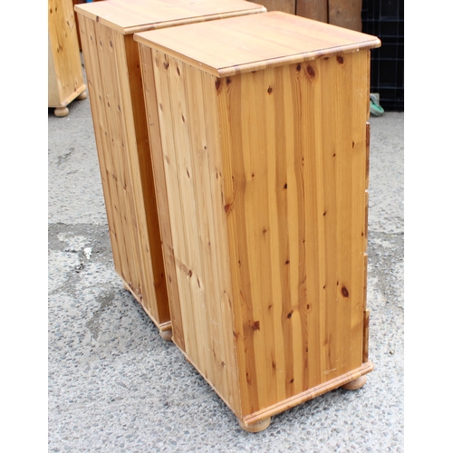 159 - A pair of modern pine 5 drawer bedside cabinets, each approx 46cm wide x 42cm deep x 98cm tall