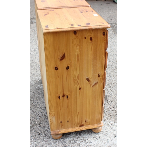 160 - A pair of modern pine 5 drawer bedside cabinets, each approx 35cm wide x 41cm deep x 85cm tall