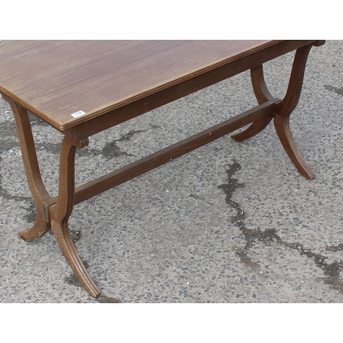 170 - A vintage tavern style table with stylised x frame legs united by a stretcher, the table with extra ... 