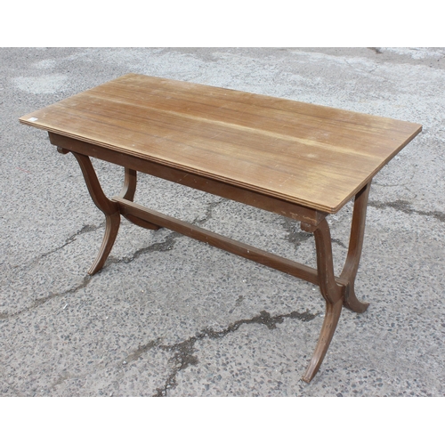 170 - A vintage tavern style table with stylised x frame legs united by a stretcher, the table with extra ... 