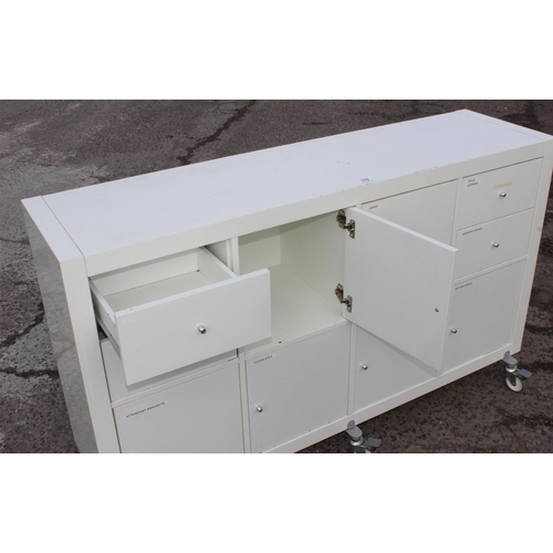 178 - A good quality white multi drawer and cupboard cabinet on wheels, ideal workshop cabinet, approx 150... 