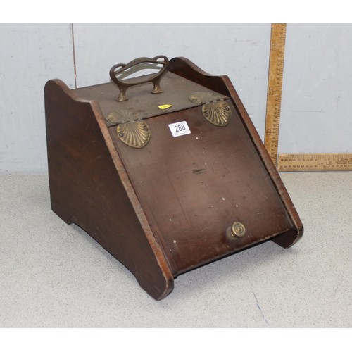 75 - An early 20th century wooden coal scuttle with scallop shaped brass hinges