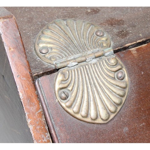 75 - An early 20th century wooden coal scuttle with scallop shaped brass hinges