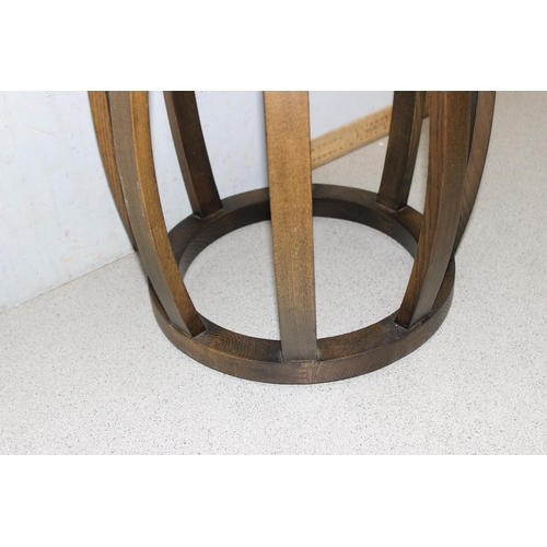 184 - An Oriental style oak stool or garden seat, approx 46cm tall