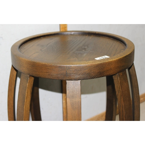 184 - An Oriental style oak stool or garden seat, approx 46cm tall