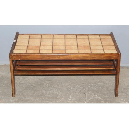 186 - A retro tile topped coffee table with magazine rack, approx 89cm wide x 49cm deep x 41cm tall & a re... 