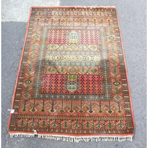 208 - A vintage Hadchlou wool rug, with labels, approx 230cm x 158cm