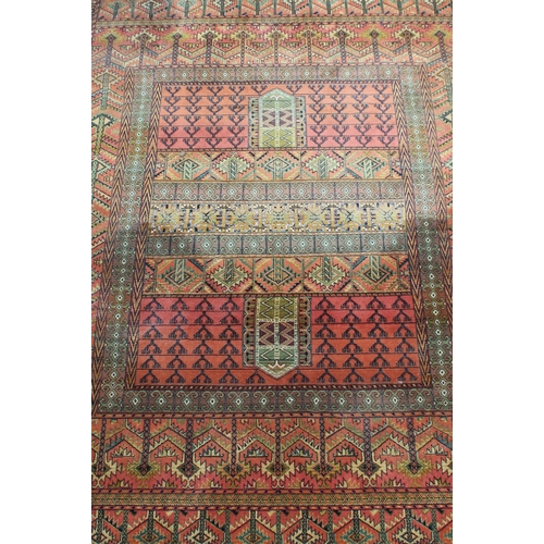 208 - A vintage Hadchlou wool rug, with labels, approx 230cm x 158cm