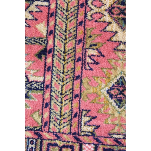 208 - A vintage Hadchlou wool rug, with labels, approx 230cm x 158cm