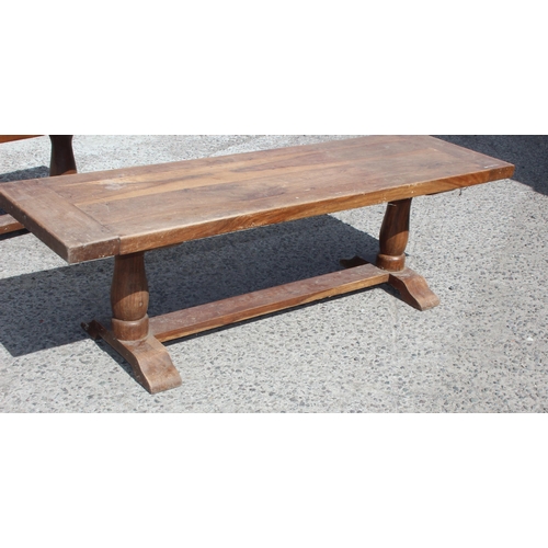 53 - A hardwood dining table and 2 matching benches, approx 180cm wide x 93cm deep x 75cm tall