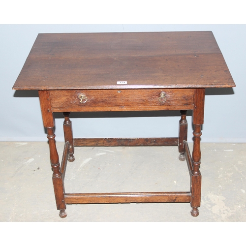 124 - An antique oak console table with single drawer and turned legs, approx 87cm wide x 61cm deep x 72cm... 