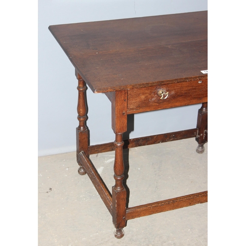 124 - An antique oak console table with single drawer and turned legs, approx 87cm wide x 61cm deep x 72cm... 