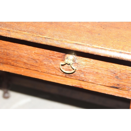 124 - An antique oak console table with single drawer and turned legs, approx 87cm wide x 61cm deep x 72cm... 