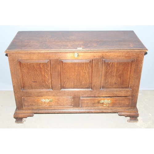 126 - An antique oak mule chest or coffer with 2 drawers, approx 118cm wide x 52cm deep x 77cm tall