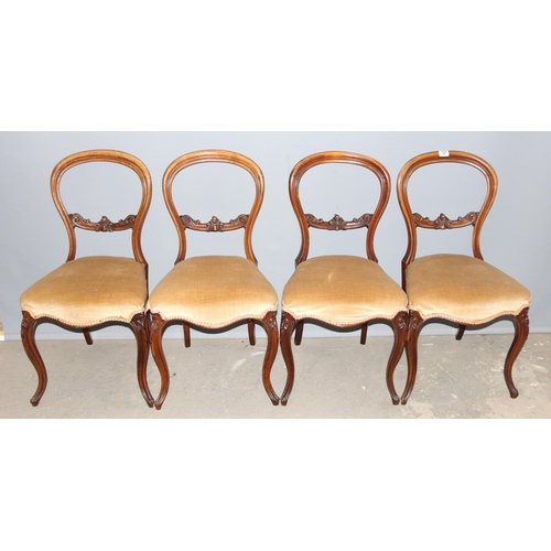 127 - A set of 4 Victorian balloon back dining chairs with stuffed seats