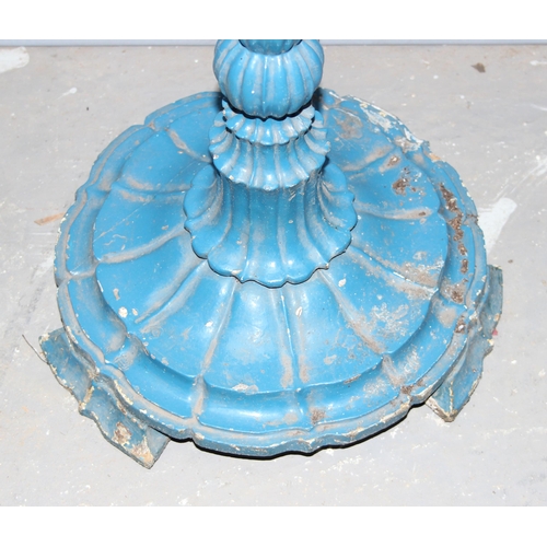 138 - A vintage blue painted wooden candlestick, approx 140cm tall