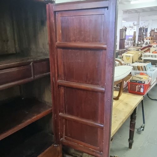 167 - A Chinese hardwood cabinet, the doors opening to reveal 3 shelves and a single drawer, likely early ... 