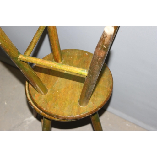 20 - A pair of vintage wooden stools, each approx 43cm tall