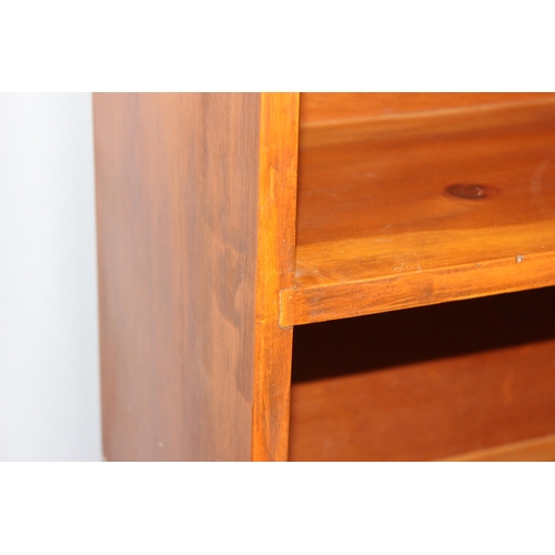 10 - Stained pine bookcase, approx 76cm wide x 29cm deep x 152cm tall