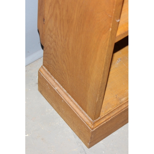 4 - A good quality modern light oak bookcase with adjustable shelves, approx 95cm wide x 25cm deep x 213... 