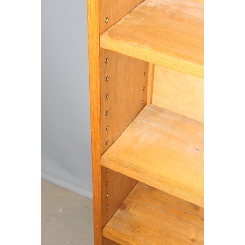 5 - A good quality modern light oak bookcase with adjustable shelves, approx 95cm wide x 25cm deep x 213... 