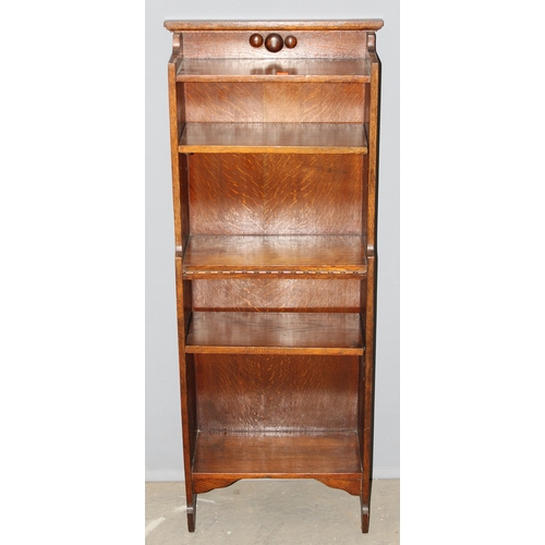 13 - An early 20th century small Arts & Crafts period oak bookcase, approx 76cm wide x 29cm deep x 152cm ... 