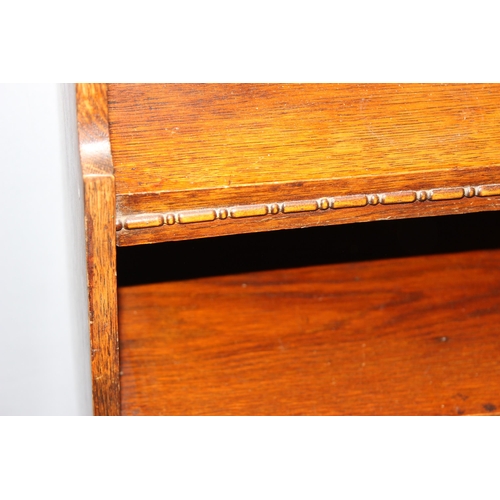 13 - An early 20th century small Arts & Crafts period oak bookcase, approx 76cm wide x 29cm deep x 152cm ... 