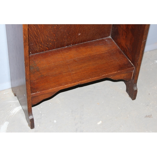 13 - An early 20th century small Arts & Crafts period oak bookcase, approx 76cm wide x 29cm deep x 152cm ... 