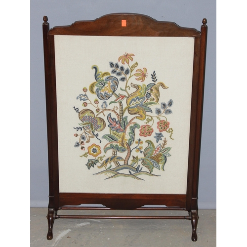 21 - An early 20th century mahogany framed fire screen with embroidered panel, approx 61cm wide x 92cm ta... 