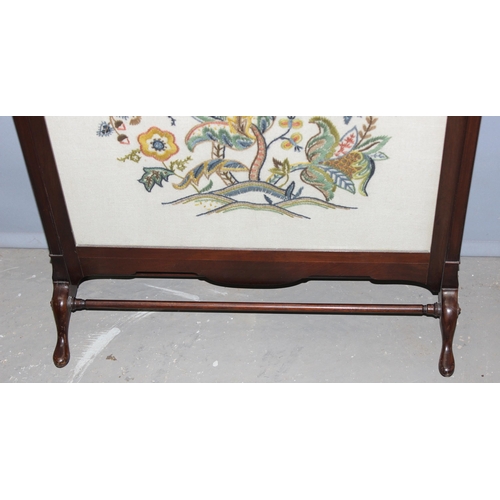 21 - An early 20th century mahogany framed fire screen with embroidered panel, approx 61cm wide x 92cm ta... 