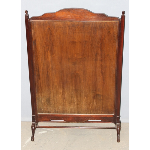 21 - An early 20th century mahogany framed fire screen with embroidered panel, approx 61cm wide x 92cm ta... 