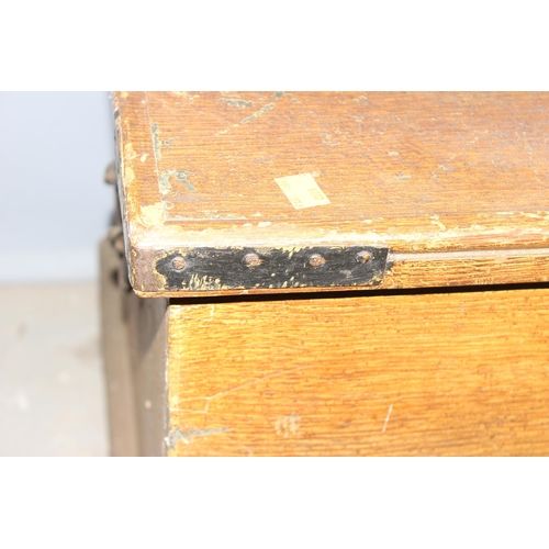 102 - An antique scumble pine box with iron corners, approx 84cm wide x 46cm deep x 44cm tall