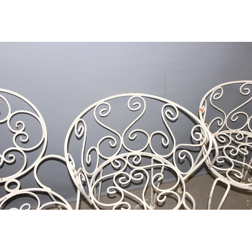 359 - 4 assorted Victorian style white painted wrought iron garden chairs. various designs