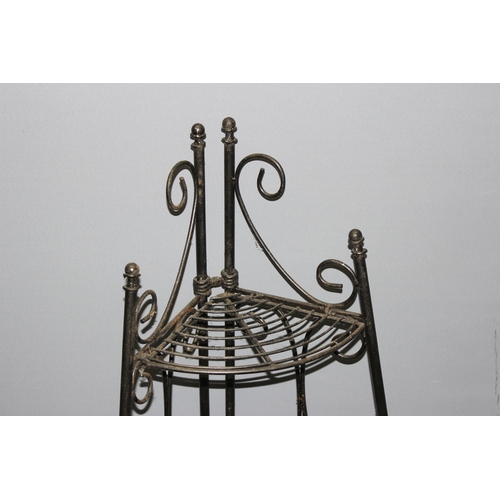 345 - A pair of antique style folding wrought iron garden plant stand shelves, each approx 32cm wide x 24c... 